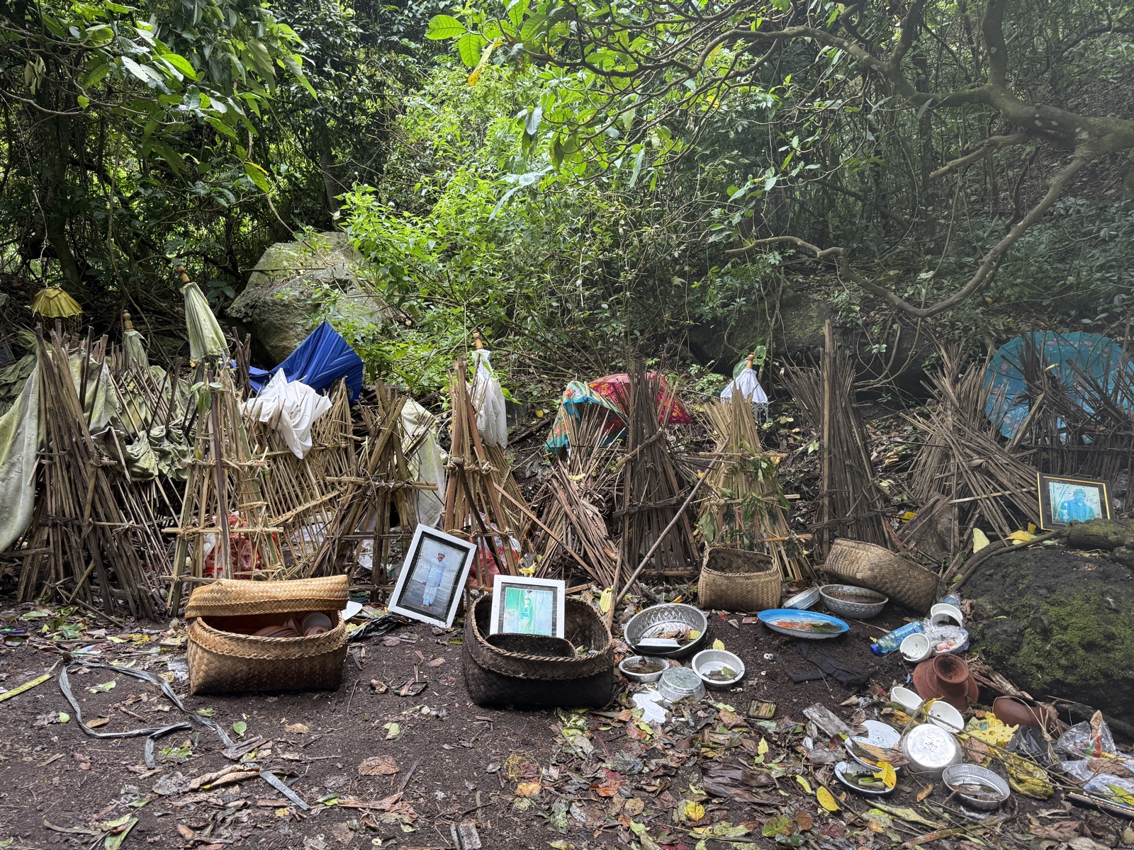 An open-air cemetery with bodies kept in cages