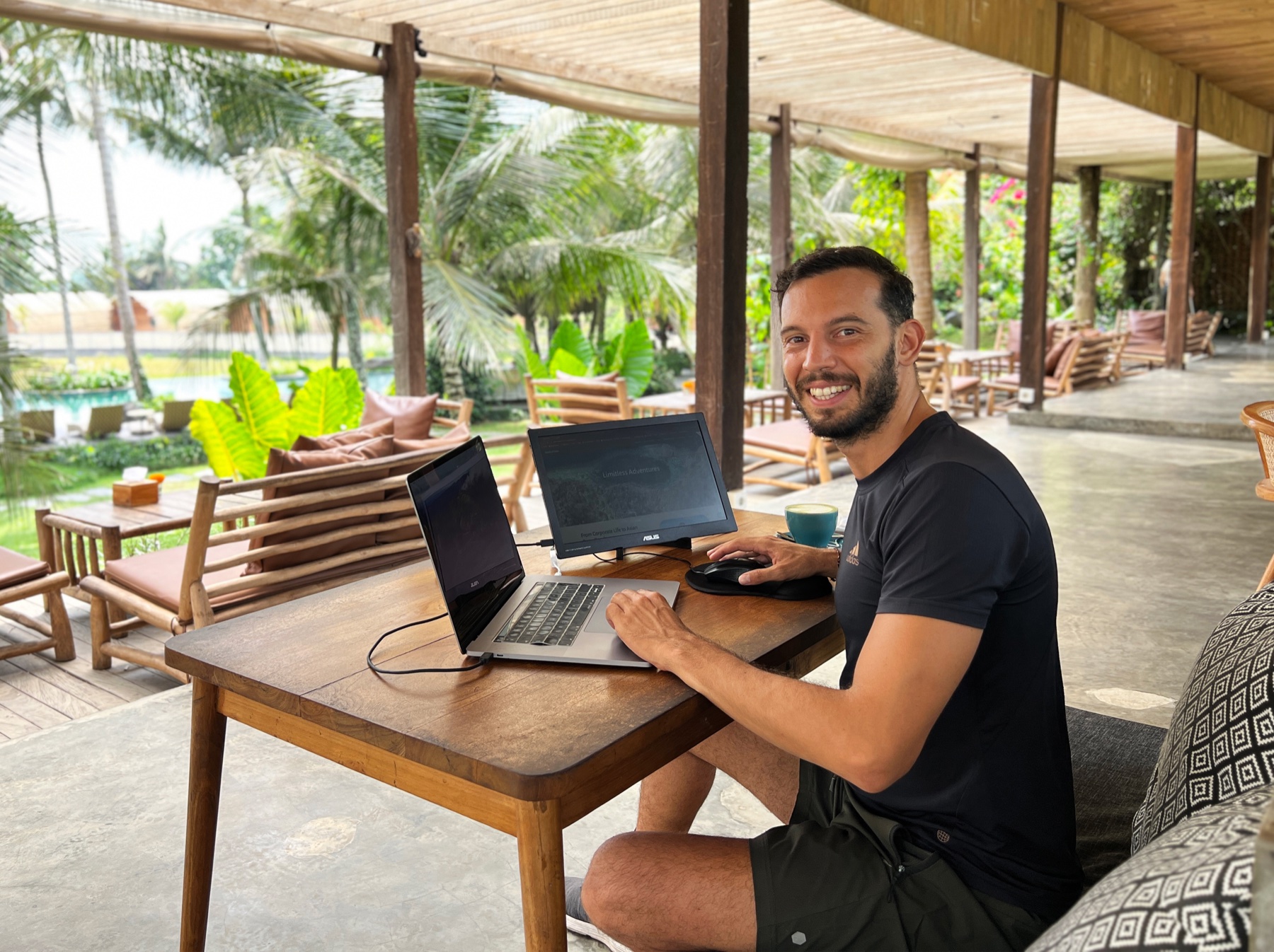 Filippo working remotely from a jungle café in Bali