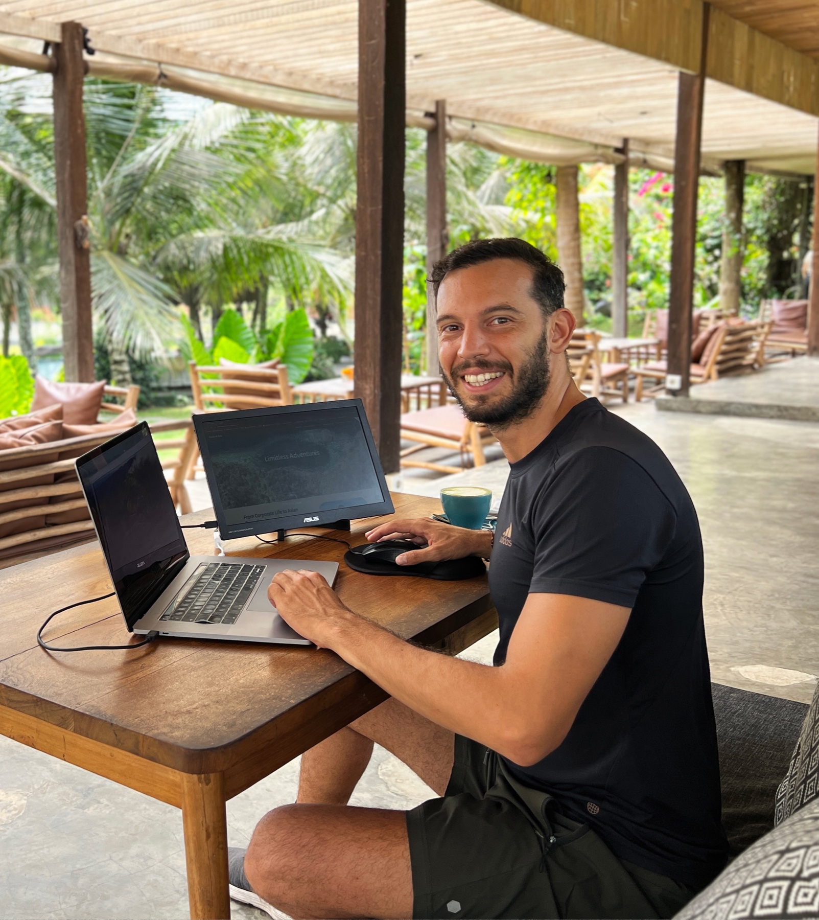 Filippo working remotely from a jungle café in Bali