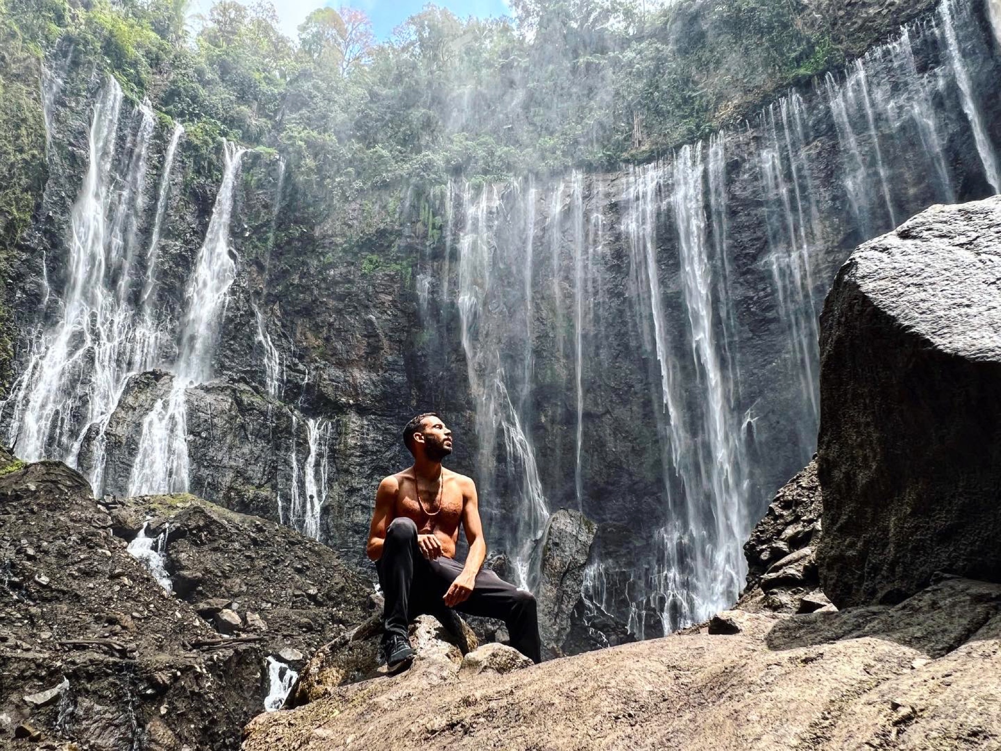 Filippo at a waterfall in Indonesia