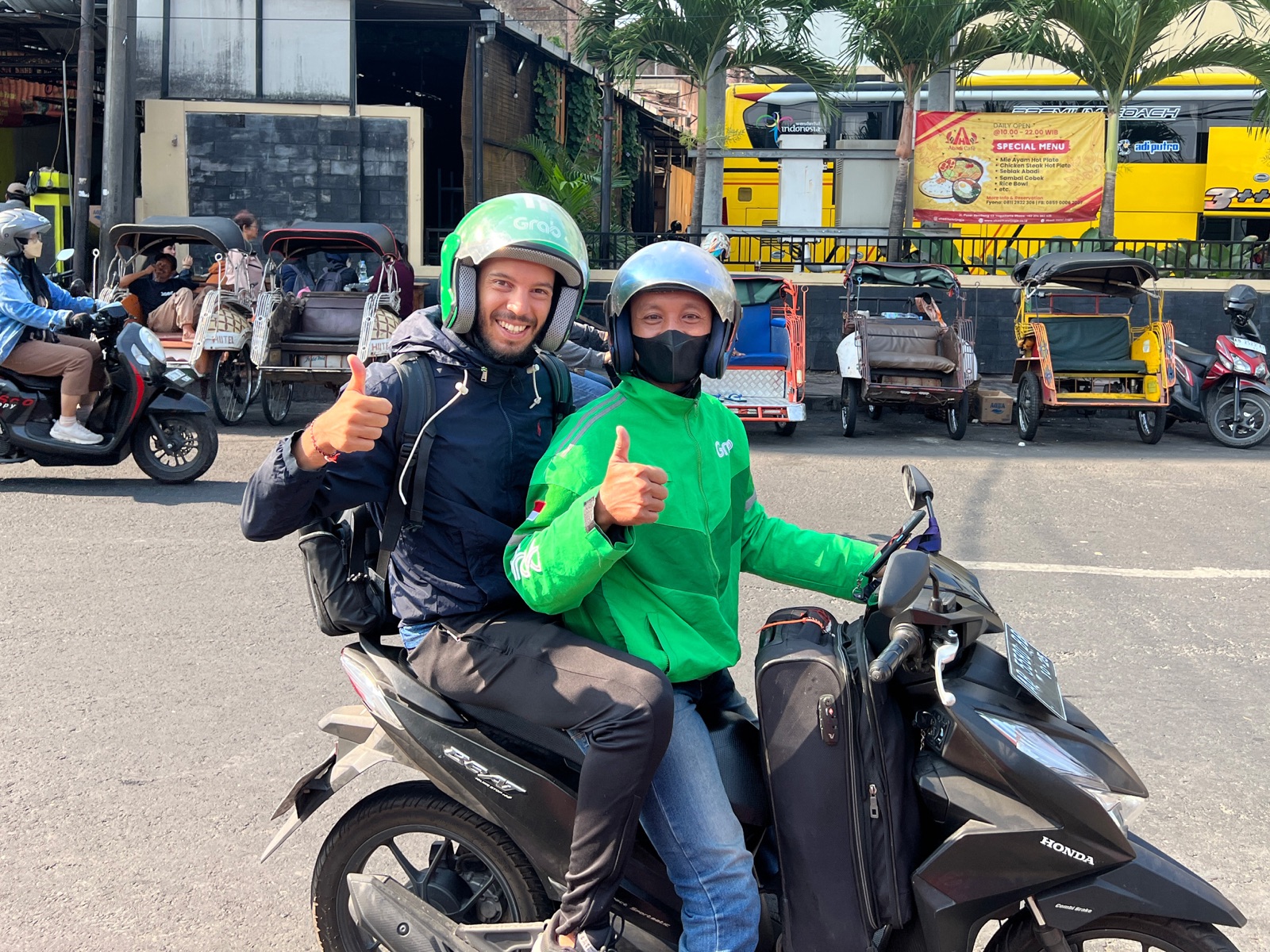 Grabbing a motorbike to the airport after selling my scooter
